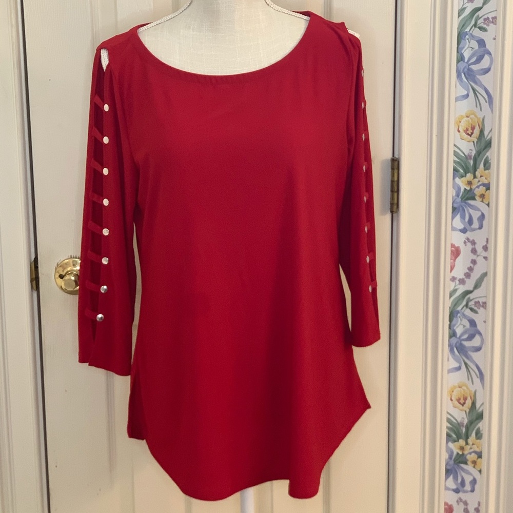 Red top with ladder detail sleeve